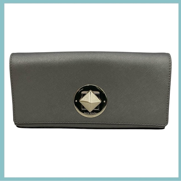 kate spade Handbags - Kate Spade Newbury Lane Keira Clutch Silver
